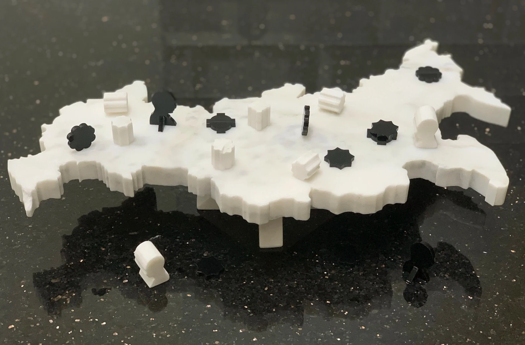 "The Game of Futures II", marble and plastic, 2019